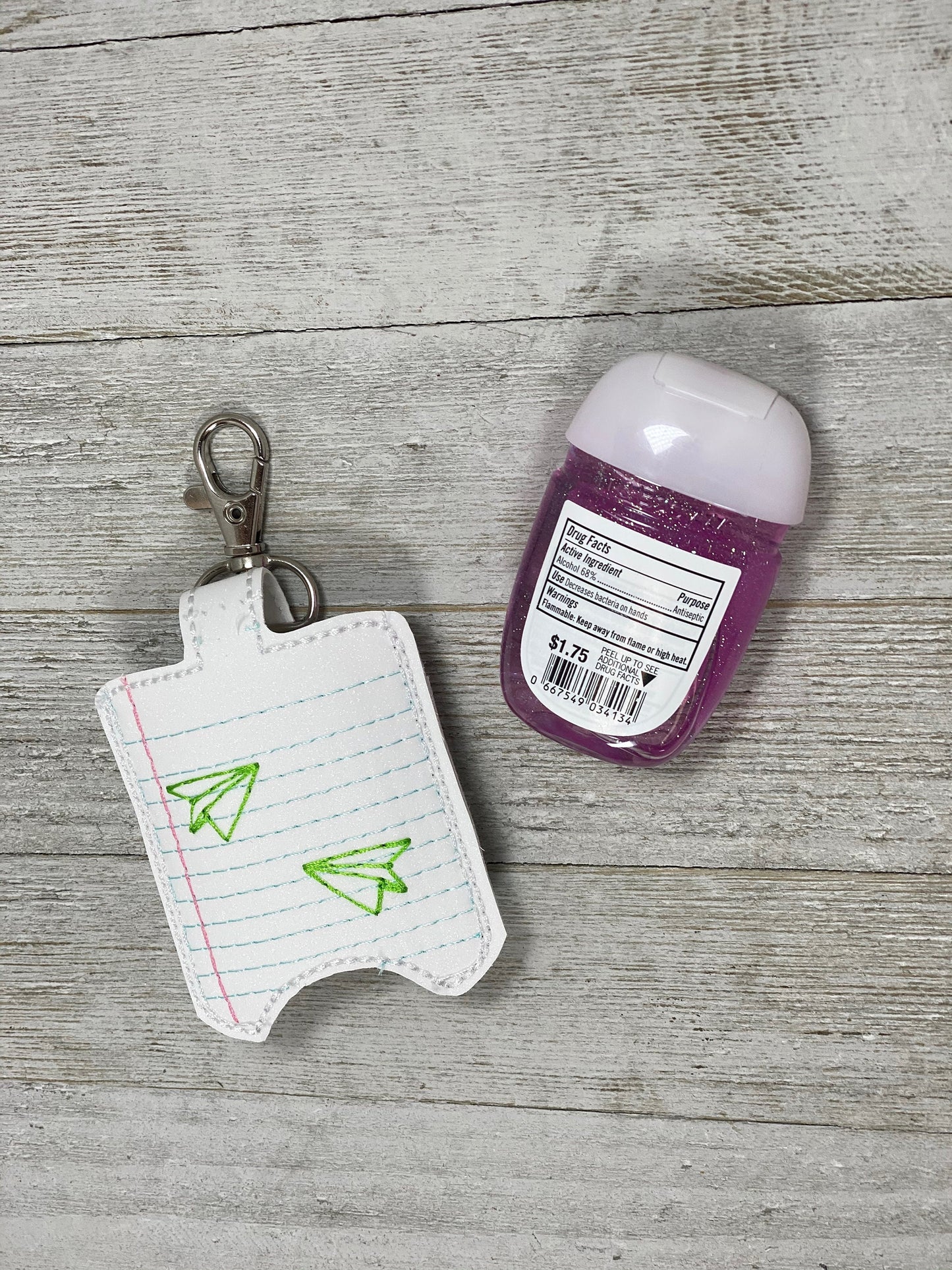 Notebook Paper with Airplanes Hand Sanitizer Holder, Teacher Doorbell Holder, Bag or Lanyard Accessory, 1 oz Size, Teacher Gift, Keychain