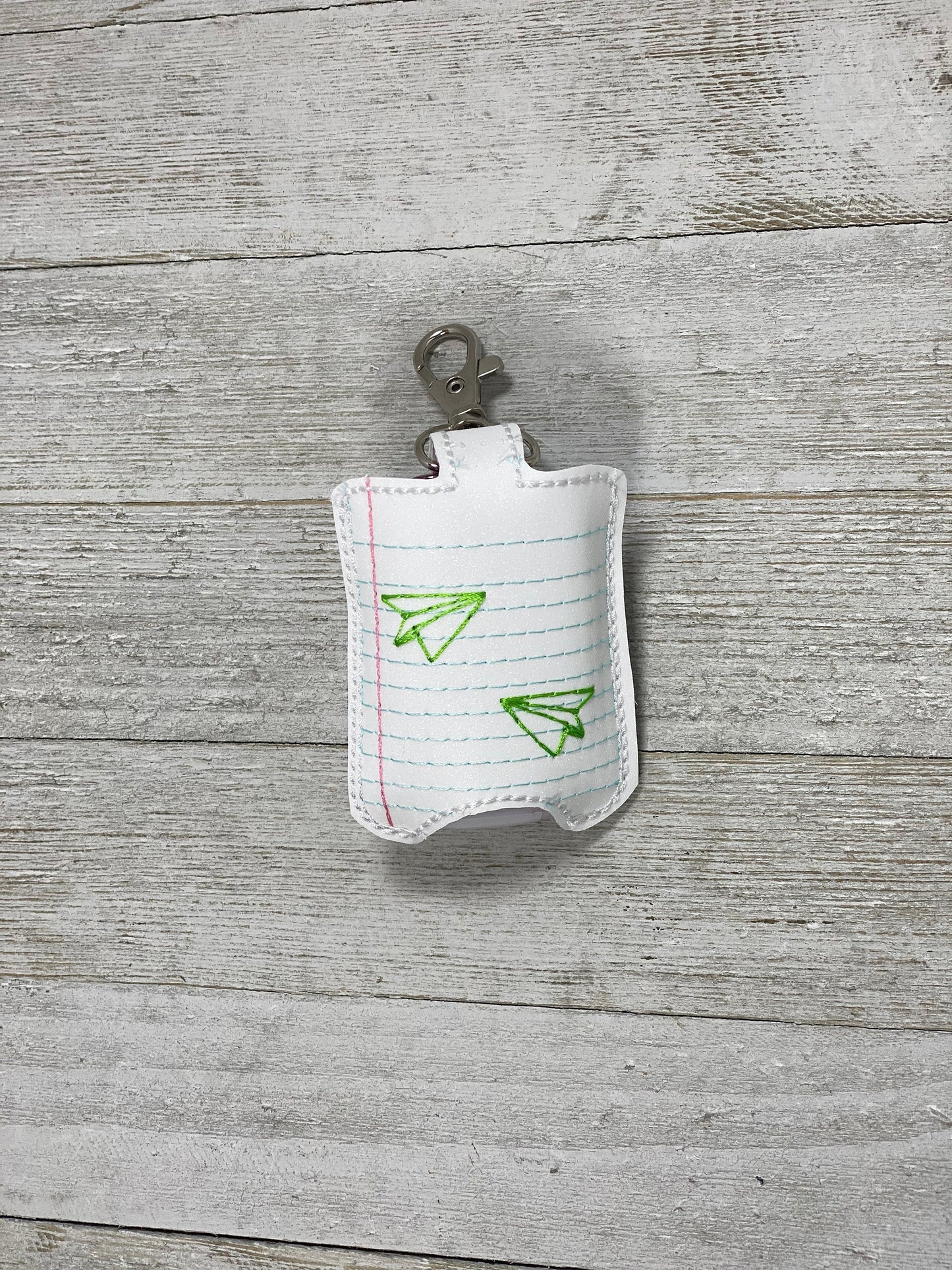 Notebook Paper with Airplanes Hand Sanitizer Holder, Teacher Doorbell Holder, Bag or Lanyard Accessory, 1 oz Size, Teacher Gift, Keychain